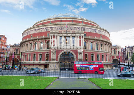 A London Bus moving passed the Royal Albert Hall, London, England Stock Photo