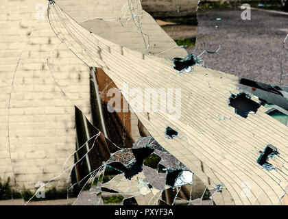 fractured reflections in broken mirror Stock Photo