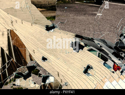 fractured reflections in broken mirror Stock Photo