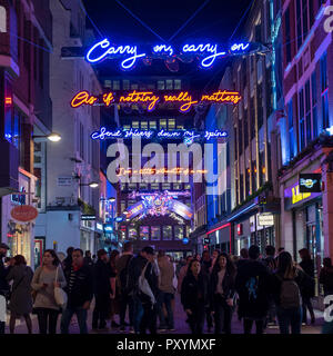 London, UK.  24 October 2018.  The Christmas lights in Carnaby Street, this year, are in the form of the lyrics to Queen's Bohemian Rhapsody to coincide with the release of the movie 'Bohemian Rhapsody', which opens in UK cinemas today.  Credit: Stephen Chung / Alamy Live News Stock Photo