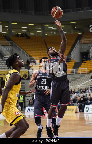 Athens, Greece. 24th Oct, 2018. 24 October 2018, Greece, Athens: Basketball: Champions League, preliminary round, Group C, 3rd matchday, AEK Athens - Brose Bamberg. Tyrese Rice (R) of Brose Bamberg and Tyler Roberson of AEK Athens are in action. Credit: Angelos Tzortzinis/dpa/Alamy Live News