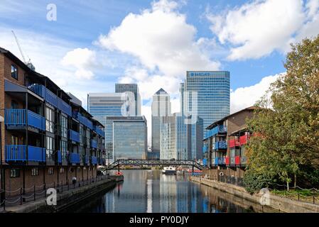Canary Wharf skyscrapers viewed from the entrance to the West India Docks London Docklands England UK Stock Photo
