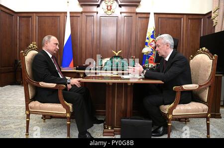 Russian President Vladimir Putin, left, holds a meeting with Moscow Mayor Sergei Sobyanin at the Kremlin October 22, 2018 in Moscow, Russia. Stock Photo