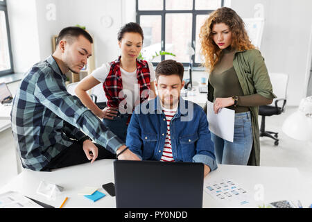 creative team working on user interface at office Stock Photo