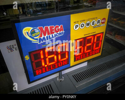 A sign on a newsstand in New York announces the enormity of the Mega Millions lottery jackpot which has reached over $2 billion, seen on Sunday, October 21, 2018.  (© Richard B. Levine) Stock Photo