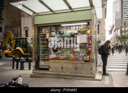 A sign on a newsstand in New York announced the enormity of the Mega Millions lottery jackpot which has reached over $2 billion, seen on Saturday, October 20, 2018.  (Â© Richard B. Levine) Stock Photo