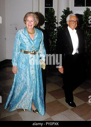Washington, DC. 6-13-1994 Katharine Graham publisher of the Washington Post is escorted by Lloyd Cutler White  House Council to the state dinner in honor of the japanese Emperor. Credit: Mark Reinstein /MediaPunch Stock Photo