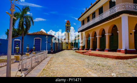 TRINIDAD, CUBA - MAY 25, 2014: Unidentified people on the street of Trinidad, Cuba. Trinidad has been a UNESCO World Heritage site since 1988. Stock Photo