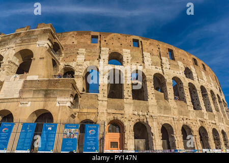 ROME, ITALY- SEPTEMBER 22, 2018: Unidentified people by Colloseum in Rome, Italy. It is most remarkable landmark of Rome and Italy. Colosseum is an el Stock Photo