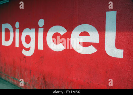 Digicel Sign Painted on wall outside King Kakaruk, Food and Drink Outlet, Okari Street, Port Moresby, Papua New Guinea. Stock Photo