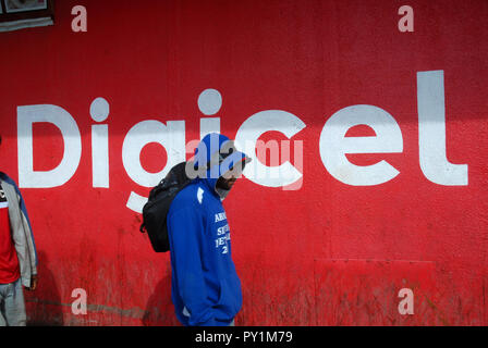 Digicel Sign Painted on wall outside King Kakaruk, Food and Drink Outlet, Okari Street, Port Moresby, Papua New Guinea. Stock Photo