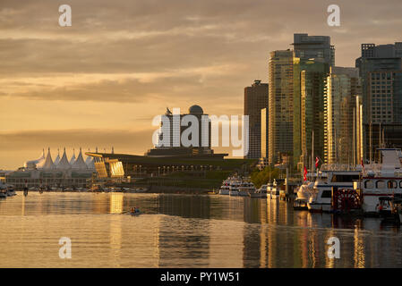 Coal Harbor, Early Morning, Vancouver. Reflections of Vancouver in a calm Coal Harbor next to Stanley Park. British Columbia. Stock Photo