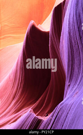 Smooth patterned colorfully illuminated rocks in the Antelope Canyon, Page, Arizona, USA Stock Photo