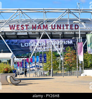 Advert sign for London Stadium on giant outdoor television screen below West Ham United sign Olympic stadium Queen Elizabeth Olympic park England UK