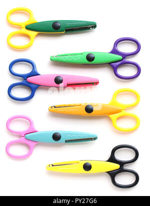 Five colorful pinking scissors for crafting and educating Stock Photo -  Alamy