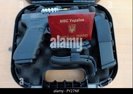 Fire-Arm “Glock” placed on a box. It was awarded soldiers of KORD (police special forces, Ukrainian SWAT). September 5,2018. Kiev, Ukraine Stock Photo