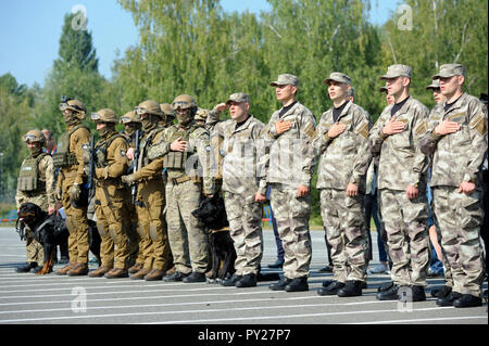 Soldiers of KORD (police strike force, SWAT), full armor, standing in a line on a ground. September 5, 2018. Kiev, Ukraine Stock Photo