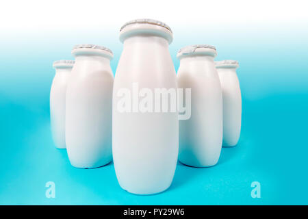 bottles of liquid yogurt isolated on a white background. Stock Photo