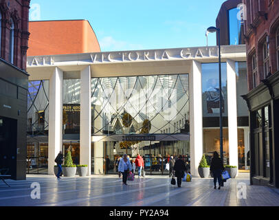 shoppers entering and leaving victoria gate shopping complex leeds yorkshire united kingdom Stock Photo