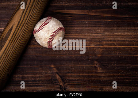 Vintage baseball gear on a wooden background Stock Photo