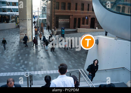 11.05.2018, Sydney, New South Wales, Australia - People are seen walking along a pedestrian zone in the business district in Barangaroo South. Stock Photo