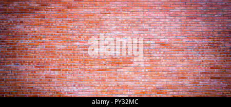 wide panorama brick wall of red color banner Stock Photo