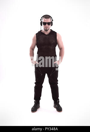 in full growth .Studio portrait of a steep rapper DJ.isolated on white Stock Photo
