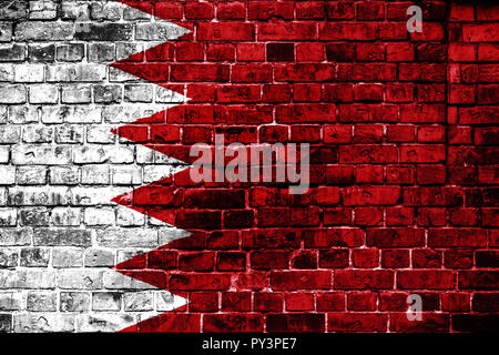 National flag of Bahrain on a brick background. Concept image for Bahrain: language , people and culture. Stock Photo