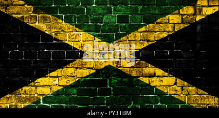 National flag of Jamaica on a brick background. Concept image for Jamaica: language , people and culture. Stock Photo