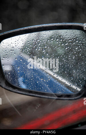 Side Mirror Of Car with Rain Stock Photo