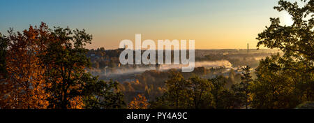 Panorama of a small city in sunset Stock Photo