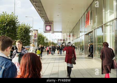 Warsaw, Poland - October 5 2018:  Shops and pedestrians on Marszałkowska street Stock Photo