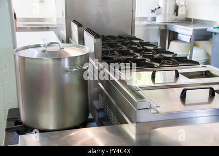 large industrial kitchen made with stainless steel. Stock Photo