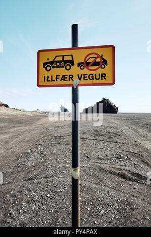 A four wheel drive car only sign in the lunar like black sand landscape of  Mýrdalssandur near Vik in south Iceland. Stock Photo