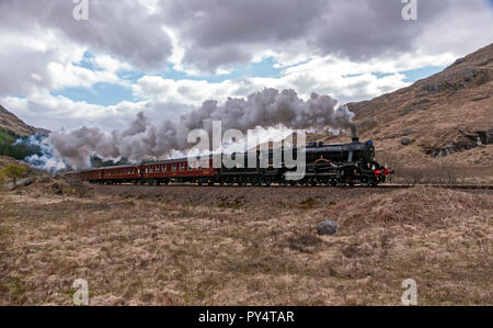 The Jacobite steam hauled train headed by  Black Five 45231 en route to Mallaig from Fort William in  Highland Scotland ascending west of Glenfinnan Stock Photo