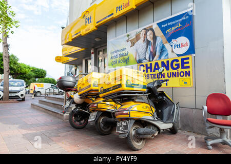 ALANYA / TURKEY - SEPTEMBER 30, 2018: Motorbikes from turkish post PTT stands in front of the PTT office in Alanya Stock Photo