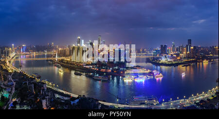 The nightscape of Chongqing.The nightscape of Chongqing Chaotianmen harbor where the Yangtze rive and Jialing river meet . Stock Photo