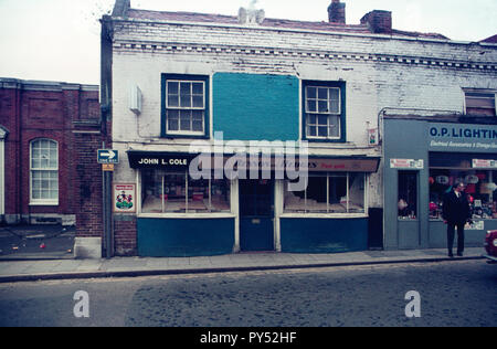 Traditional sweet shop in Cosham High Street, 1975 on a Sunday as the covered window displays show Stock Photo