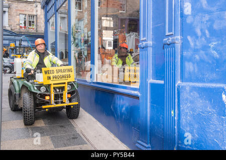 Weed spraying quad bike on Blackfriars street Stock Photo - Alamy