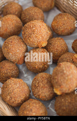 A wicker basket full of artisan scotch eggs Stock Photo