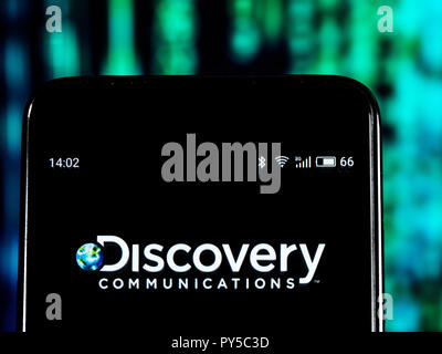Discovery, Inc. Mass media company logo seen displayed on smart phone. Discovery, Inc. is an American mass media company primarily operates factual television networks, such as its namesake Discovery Channel, Animal Planet, Investigation Discovery, Science Channel, TLC, and other spin-off brands. Stock Photo