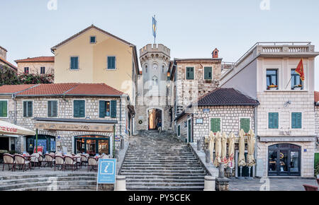 Old gates of the city and the Sakhat Kula tower with the clock in Herceg Novi, Montenegro Stock Photo