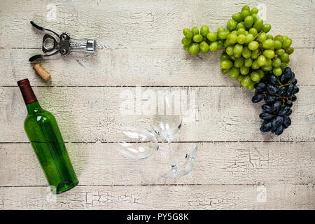 Background with wine bottle, glasses and grapes Stock Photo