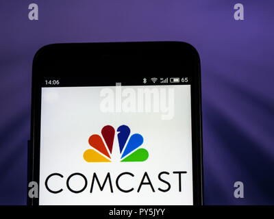 Kiev, Ukraine. 25th Oct, 2018. Comcast Telecommunications company logo seen displayed on smart phone. Comcast Corporation is an American global telecommunications conglomerate head quartered in Philadelphia, Pennsylvania. Credit: Igor Golovniov/SOPA Images/ZUMA Wire/Alamy Live News Stock Photo