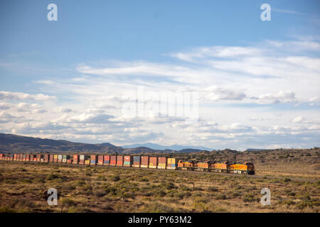 Long freight train outside Albuquerque, New Mexico, seen from the Amtrak train Southwest Chief, October 10, 2018. Stock Photo