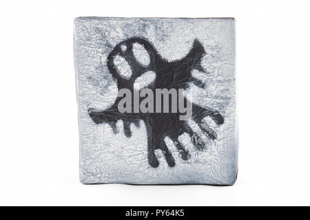 Ghost on crumpled paper. Halloween background decoration holiday concept. Stock Photo