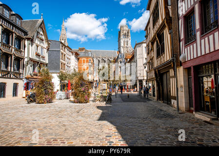 Cozy square with beautiful buildings and cathedral on the background in Rouen city, France Stock Photo