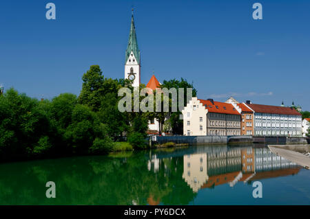 At the river Iller in Kempten, in the background the steeple of church St. Mang, Allgäu, Bavaria, Germany Stock Photo