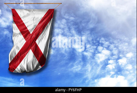 Flag State of Alabama. Vertical flag, against blue sky with place for your text Stock Photo