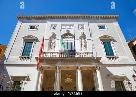 VENICE, ITALY - AUGUST 14, 2017: Theater La Fenice building facade in a sunny summer day, clear blue sky in Venice, Italy Stock Photo